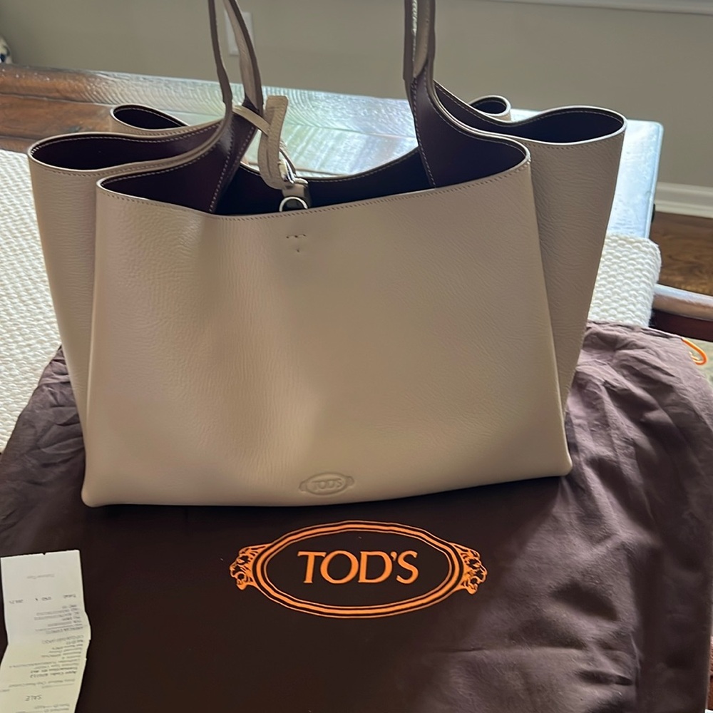Tod’s Timeless Leather Medium Shopping Tote. Beautiful leather with T Pendant